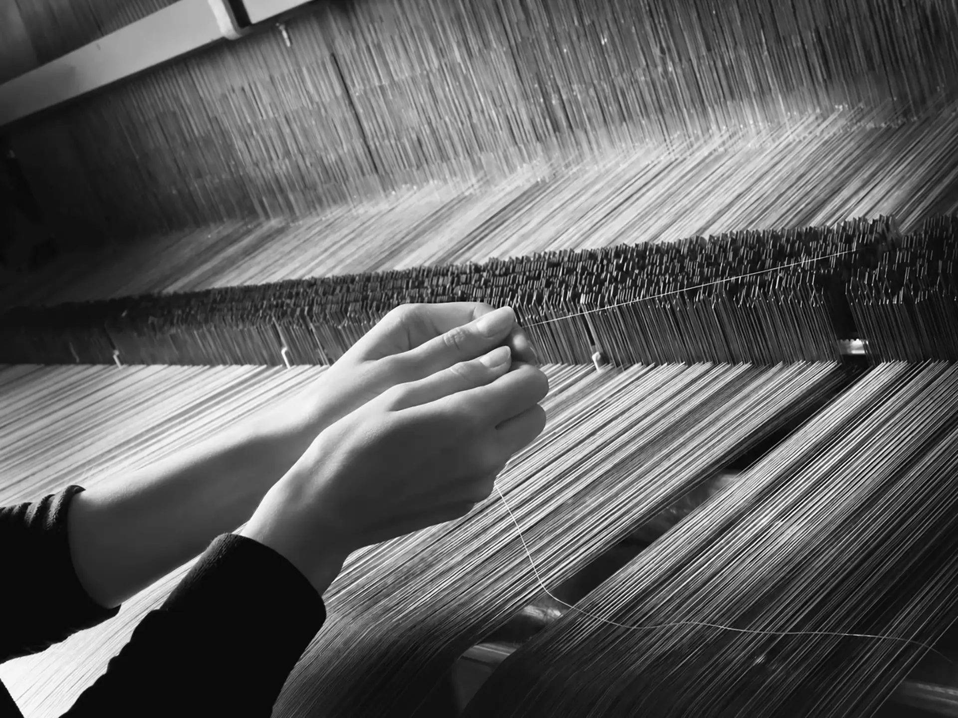 A loom at work in the Beltrami mill