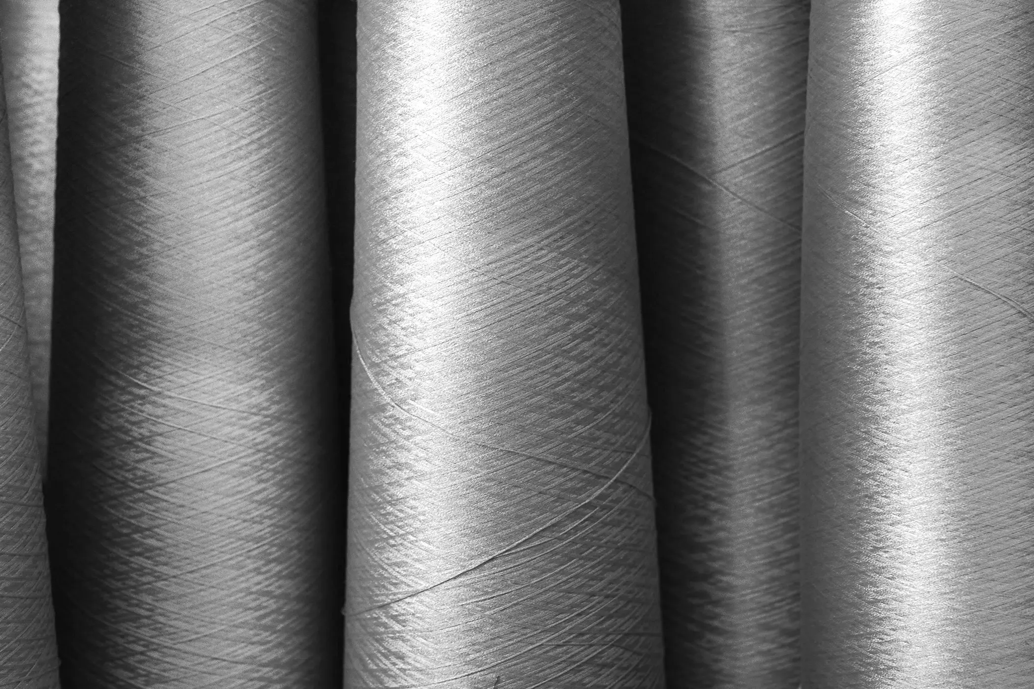 Cones of yarn spun from Autentica Fibra di Legno Beltrami