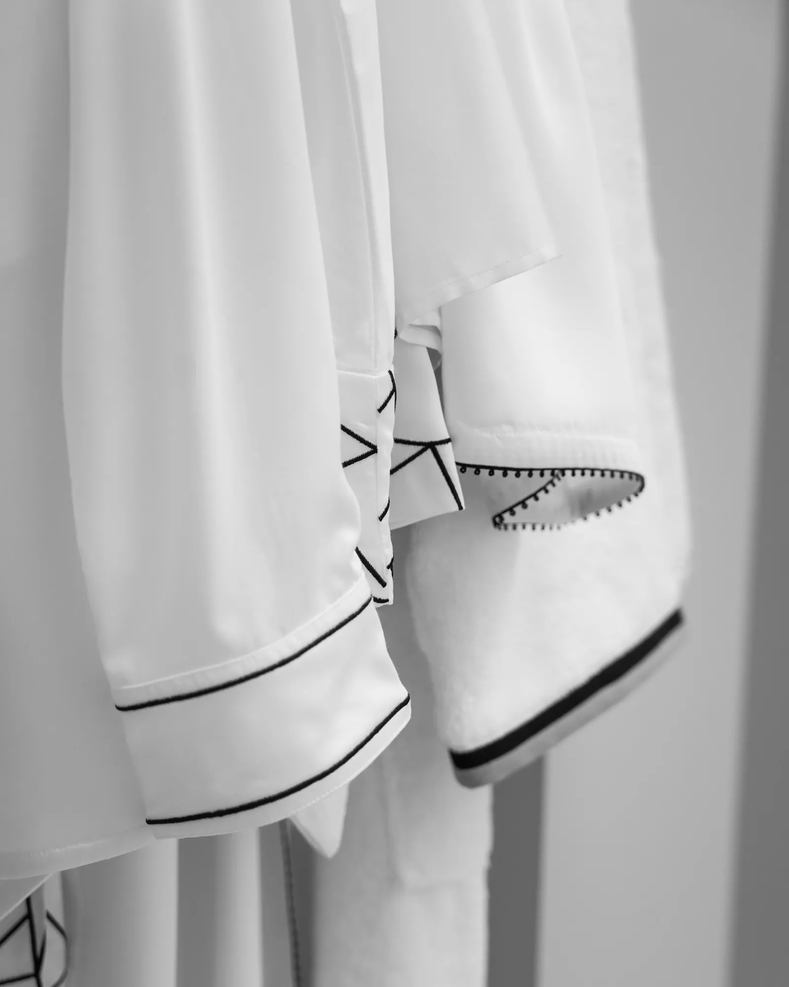 Embroidered cuff detail on a Beltrami textile